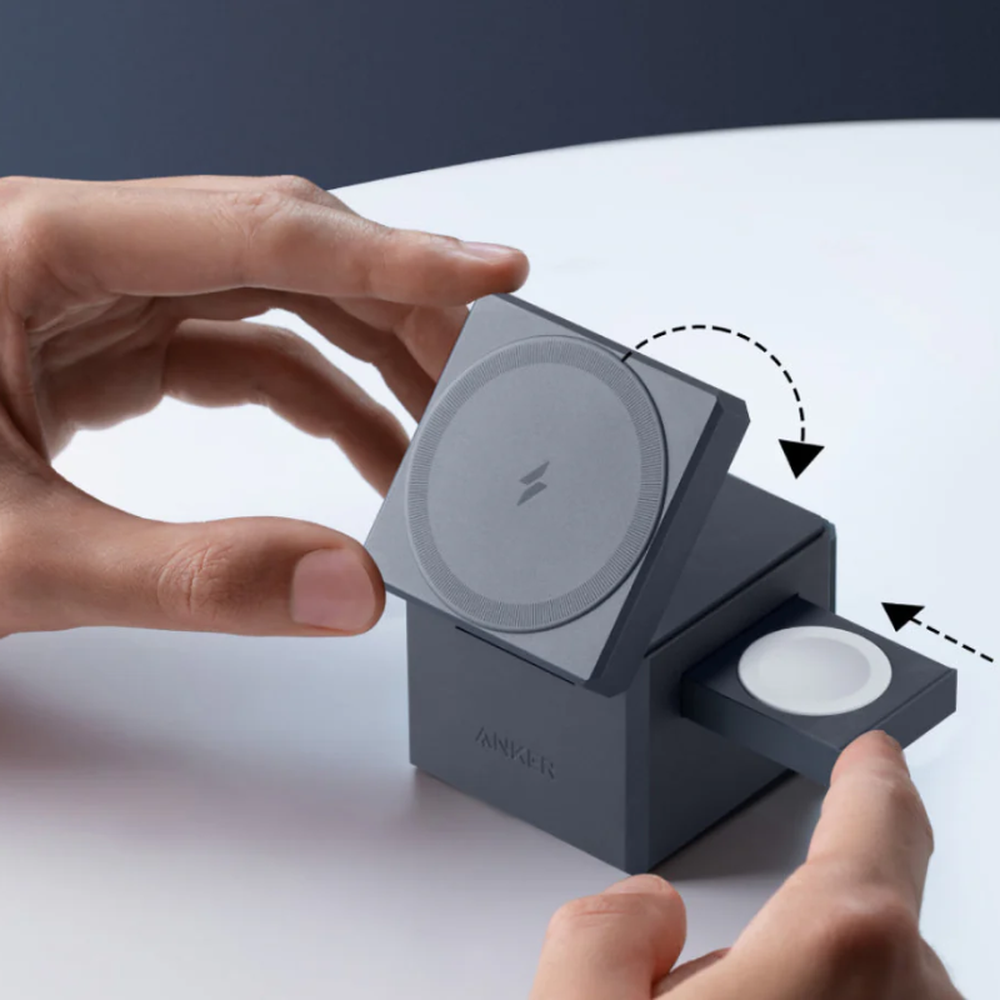 Foldable Anker cube charger demonstrating rotating lid and sliding side dock mechanism