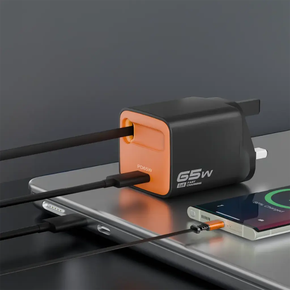 Black Porodo 65W GaN wall charger with retractable USB-C cable charging smartphone