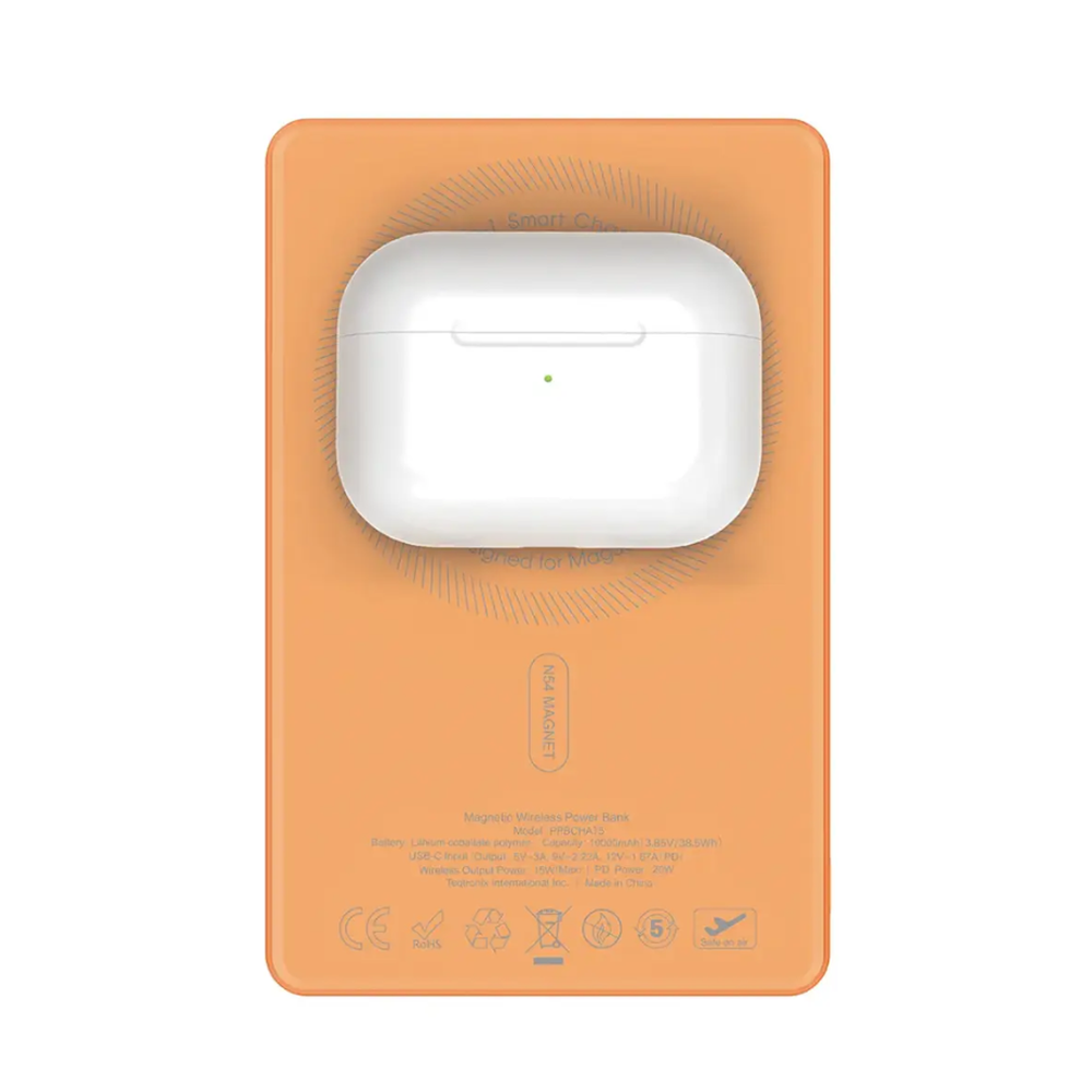 Orange wireless power bank with white AirPods case magnetically attached on top