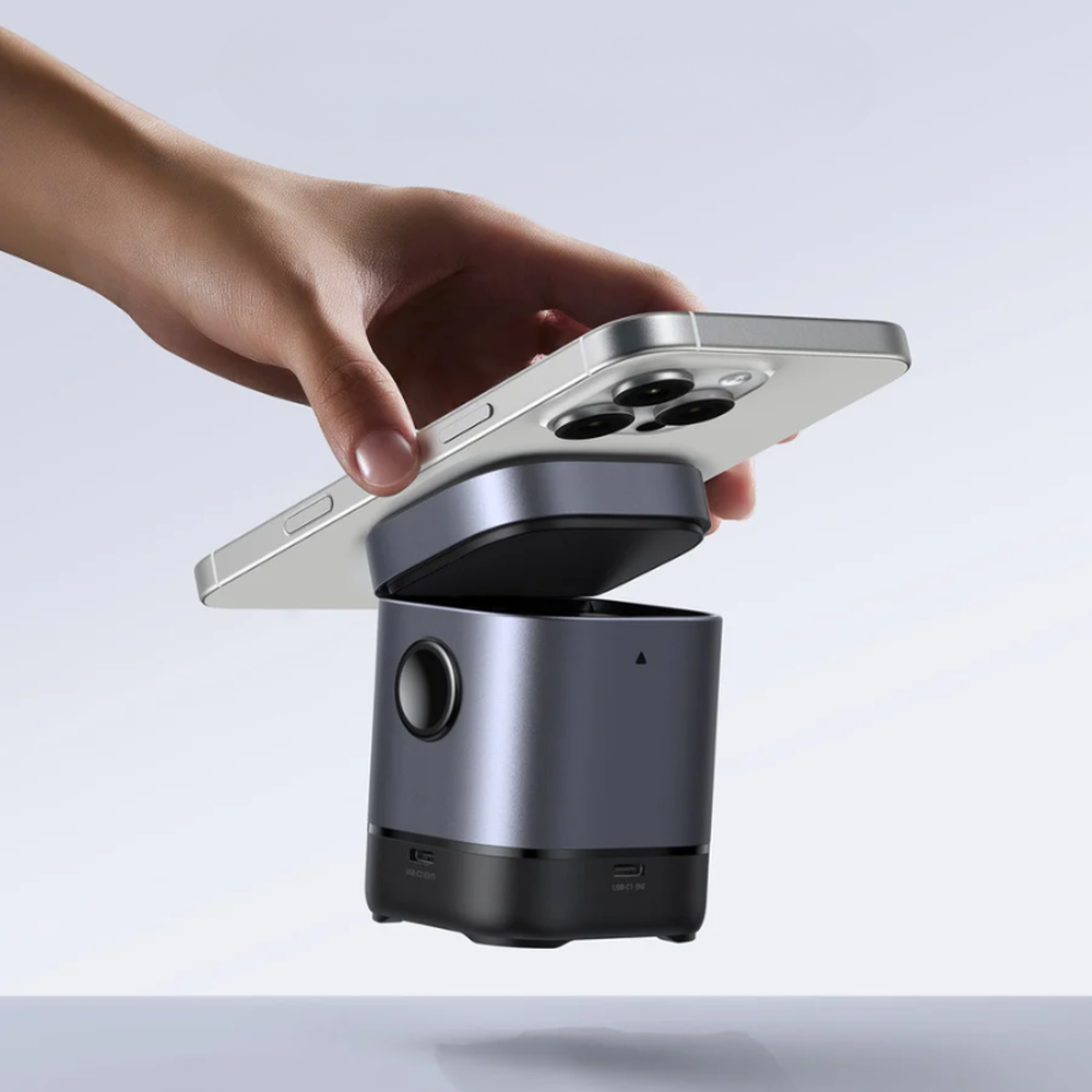 Ugreen 15W magnetic wireless charger with open lid revealing Qi pad and PD ports