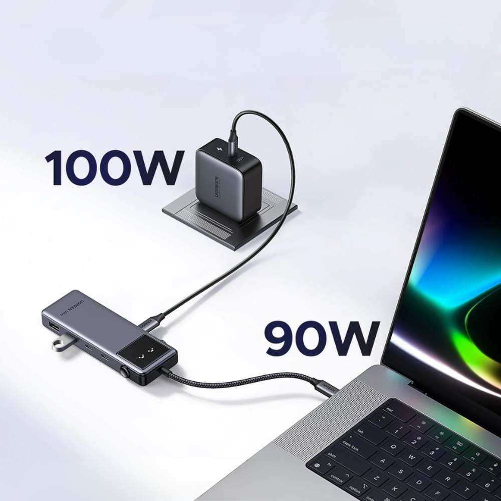 Ugreen USB-C hub delivering 100W power to laptop and adapter