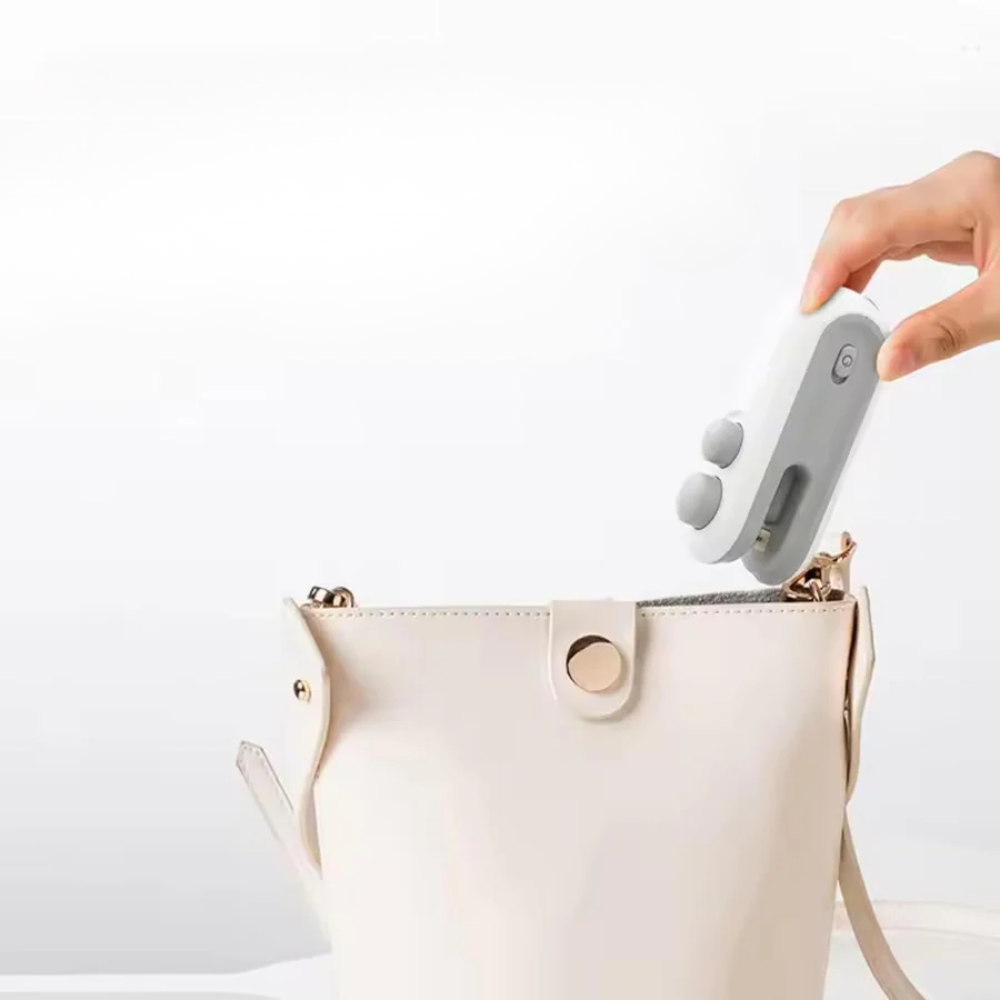 Portable heat sealer fitting inside leather purse