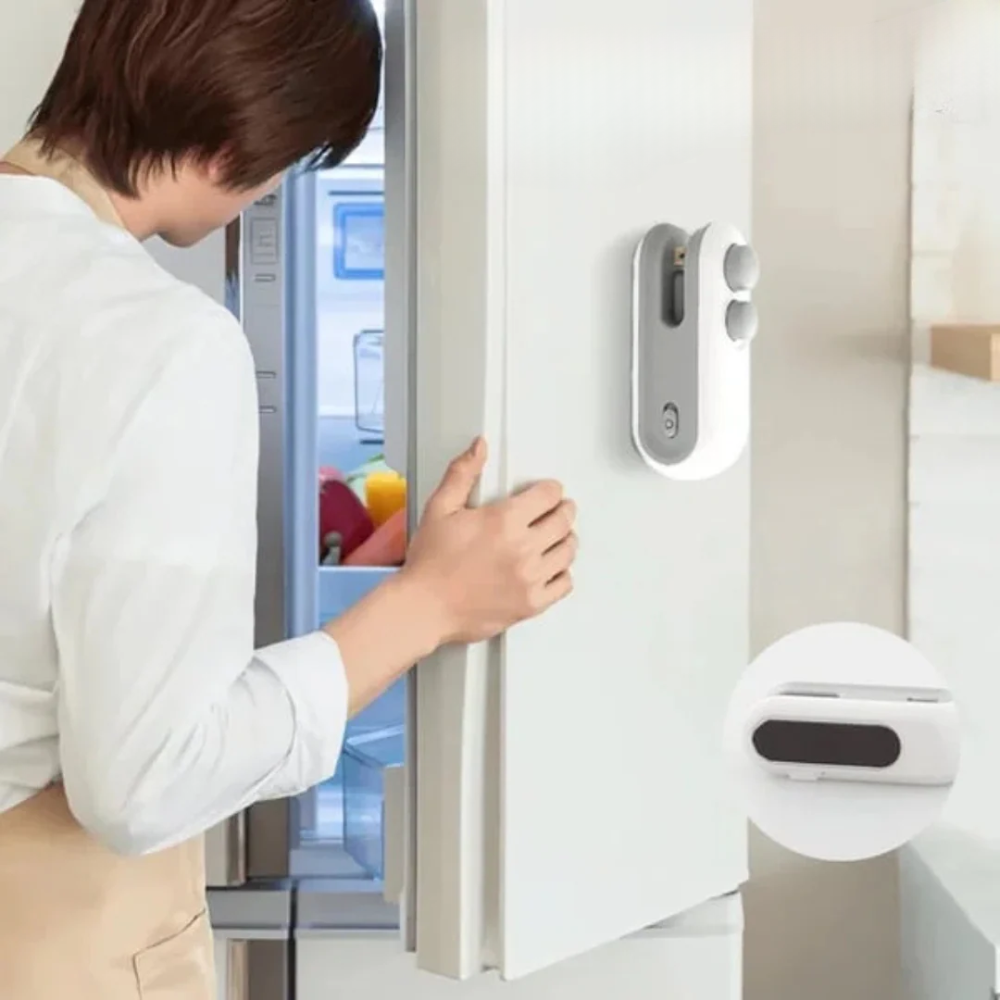 Magnetic mount handheld food sealer on refrigerator door