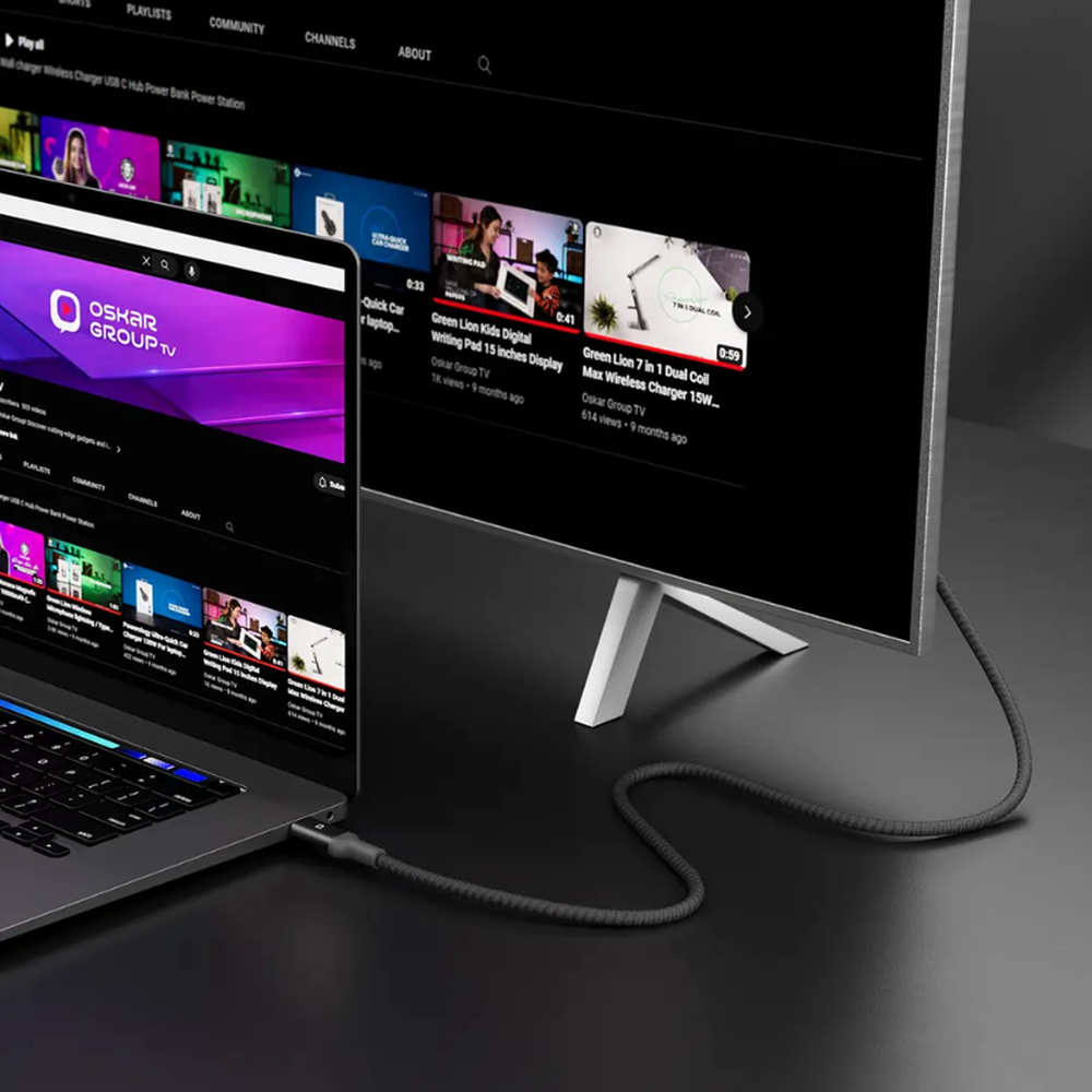 USB-C to HDMI cable connecting laptop to external monitor for streaming