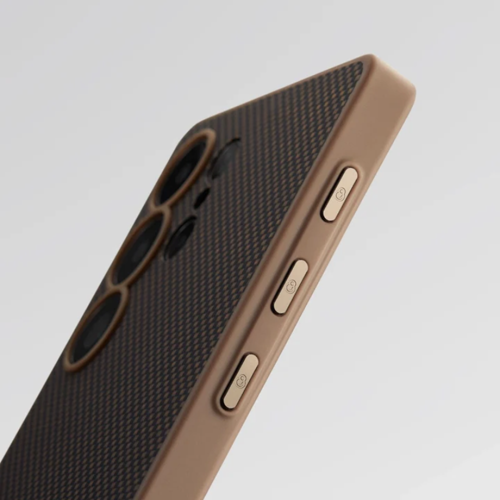 Close-up of Pitaka S25 brown case buttons and carbon fiber texture detail