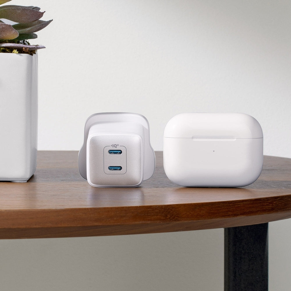Anker Nano Pro 40W compact charger shown next to wireless earbuds case