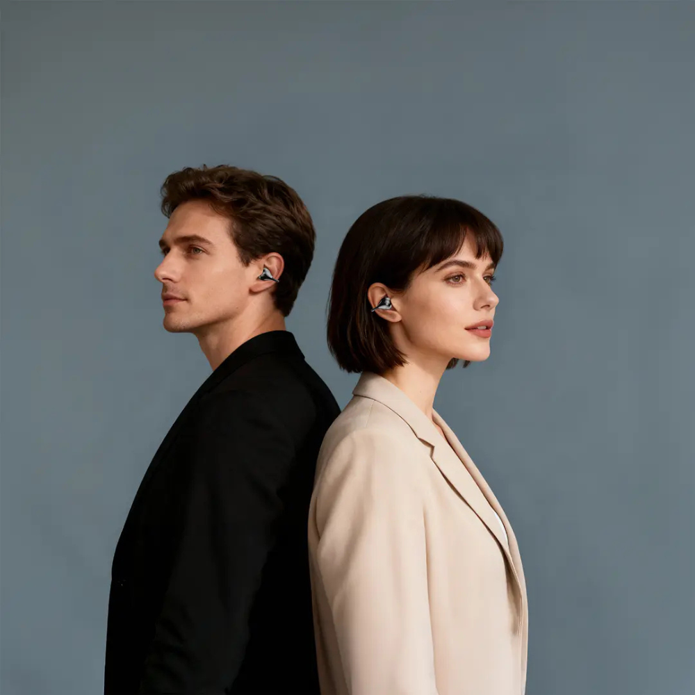 Couple wearing black Salvador open-ear headphones for secure fit and ambient awareness
