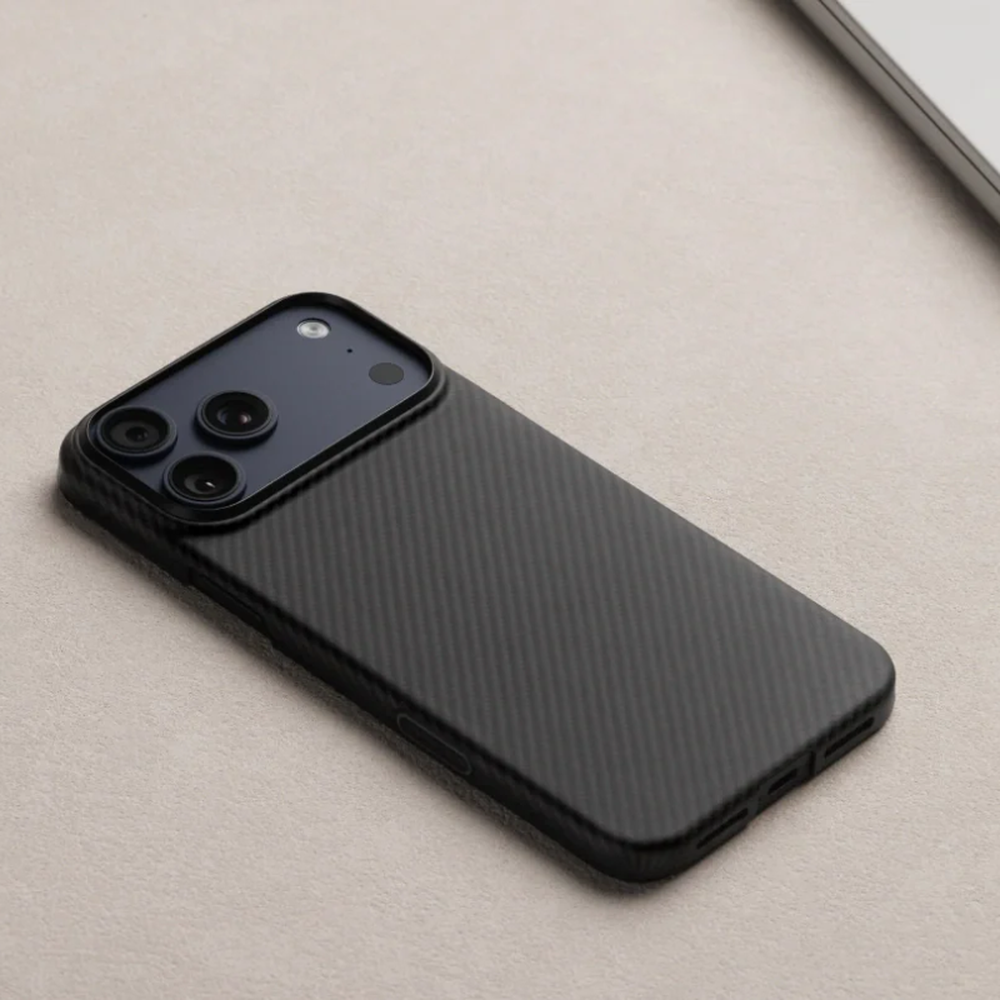 Black diagonal ribbed Pitaka iPhone 17 case with matte aramid texture