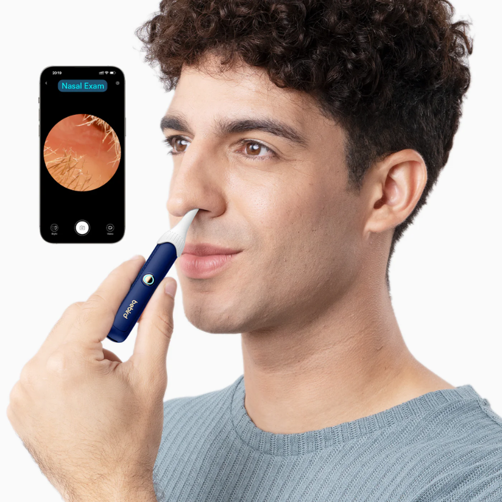 Bebird nasal inspection kit with flexible camera showing real-time internal nose view on smartphone