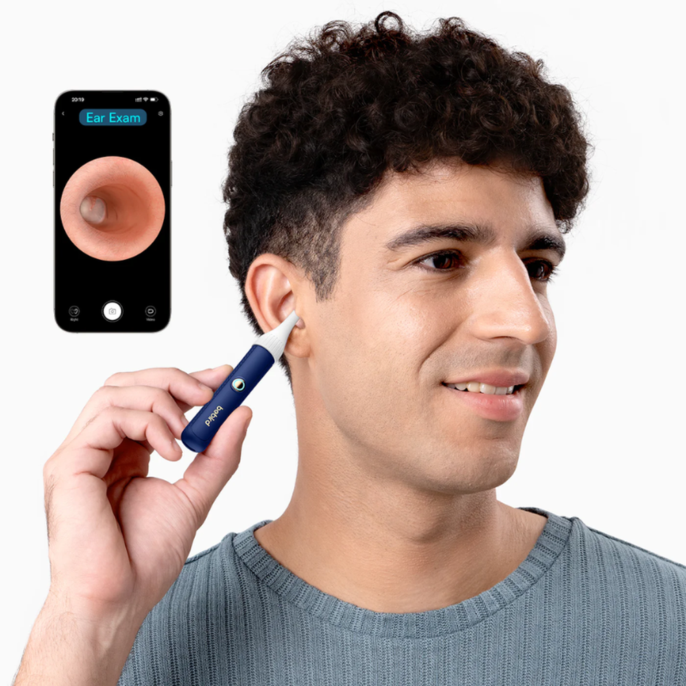Man performing ear inspection with Bebird flexible camera and live HD visualization