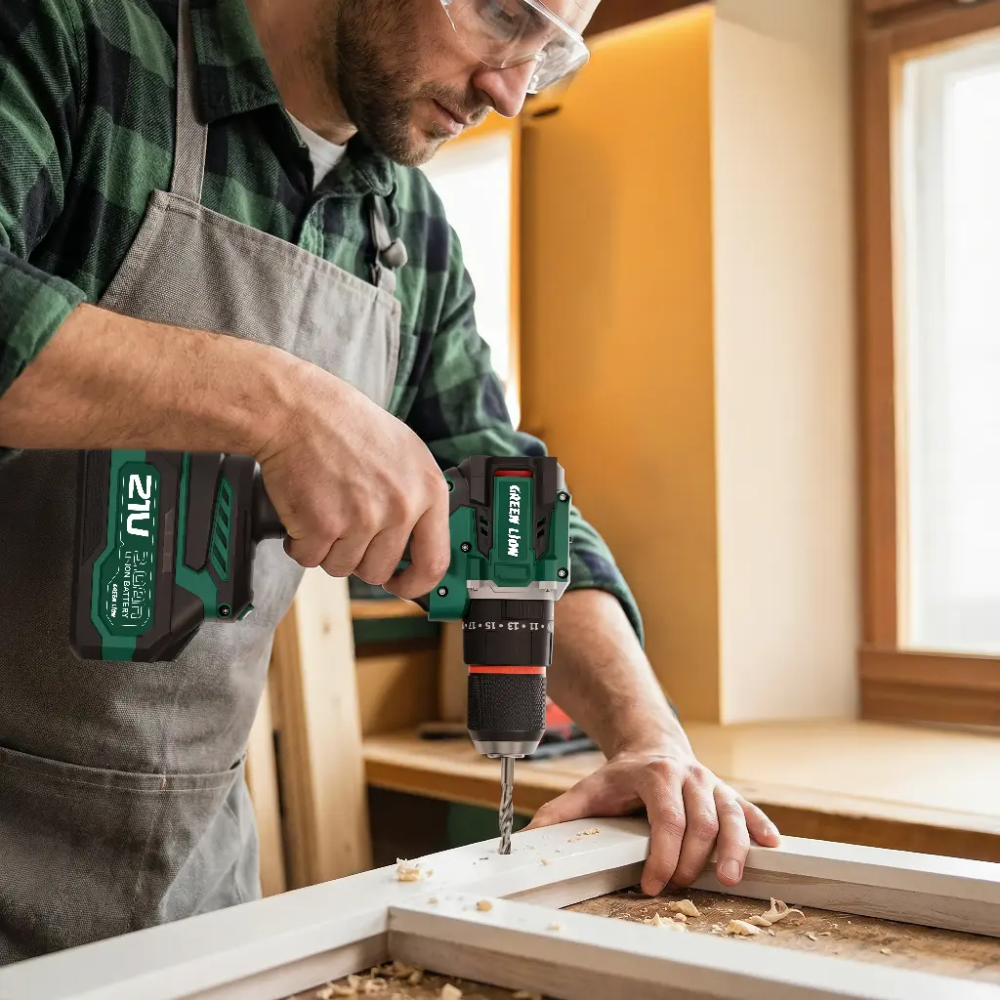 Green Lion 21V cordless hammer drill in action drilling wood with safety gear