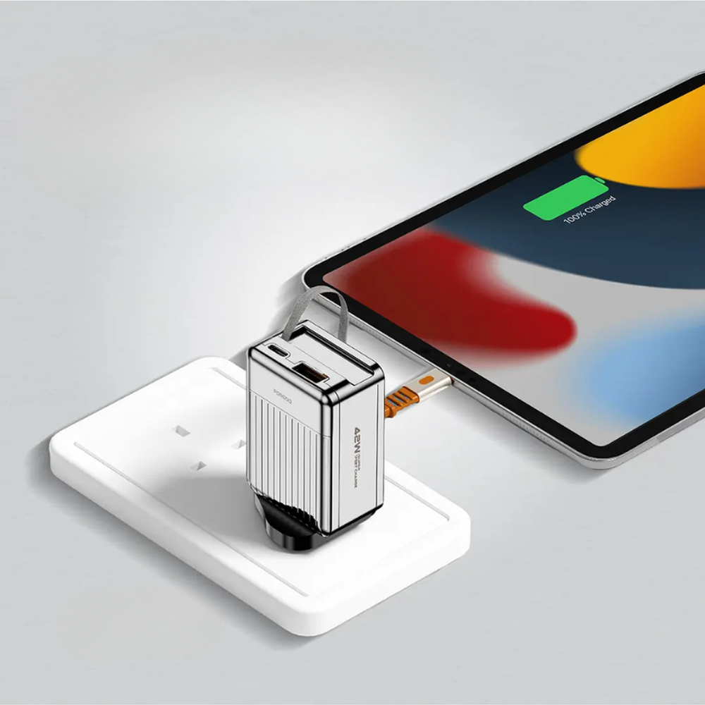 Silver Porodo 42W GaN charger charging tablet via retractable orange USB-C cable