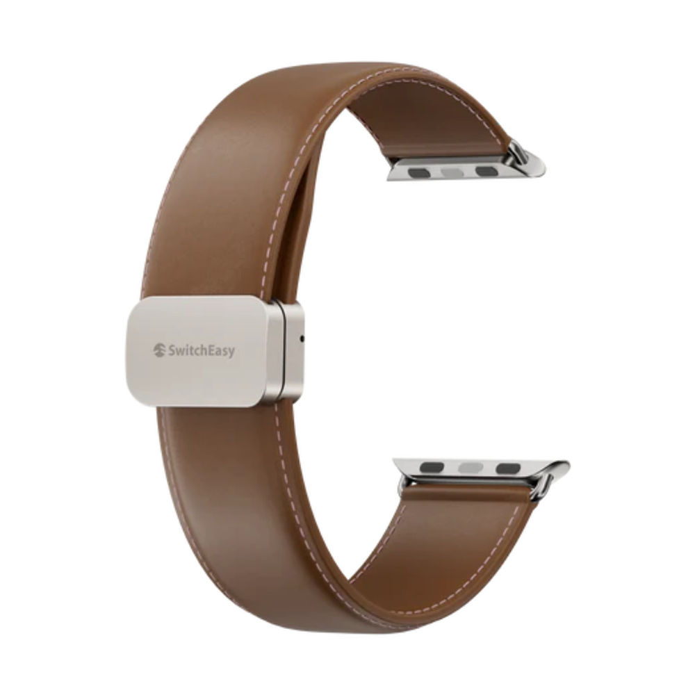 Open magnetic clasp on brown leather Apple Watch band revealing connectors