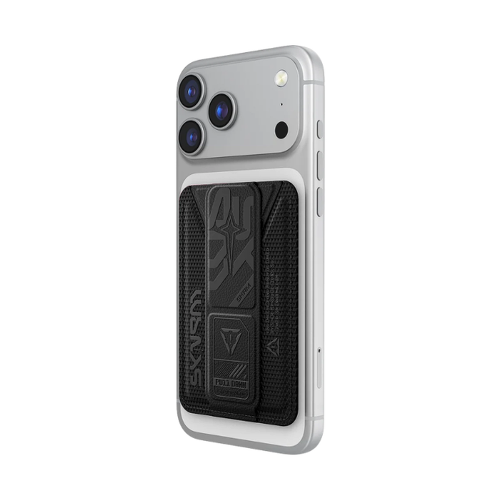 Black carbon-fiber textured Skinarma Phantom magnetic card holder folded flat