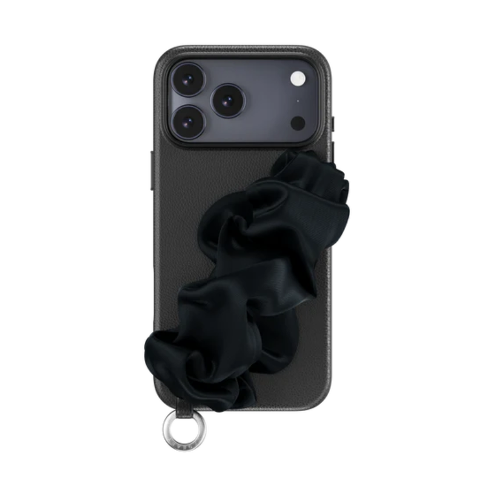 Black textured phone case with silk-like scarf strap and metal loop accessory