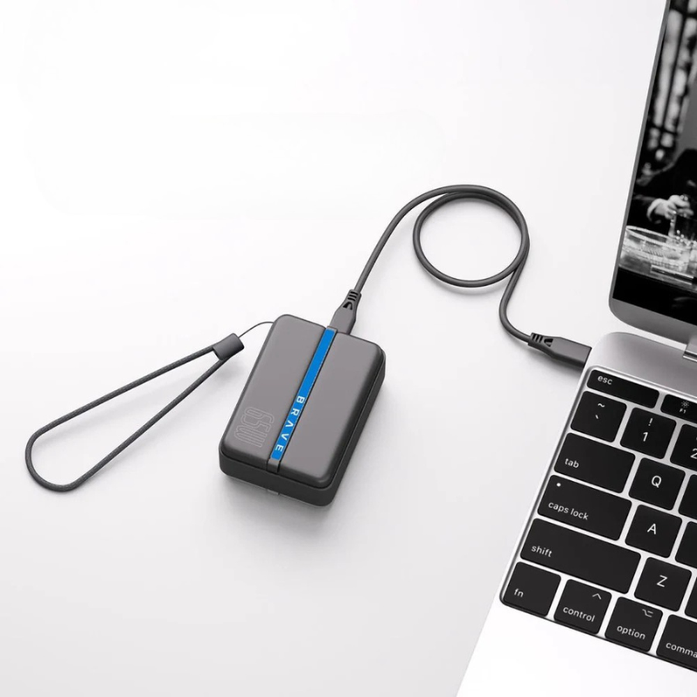 Black Brave 65W PowerBank with wrist strap charging laptop