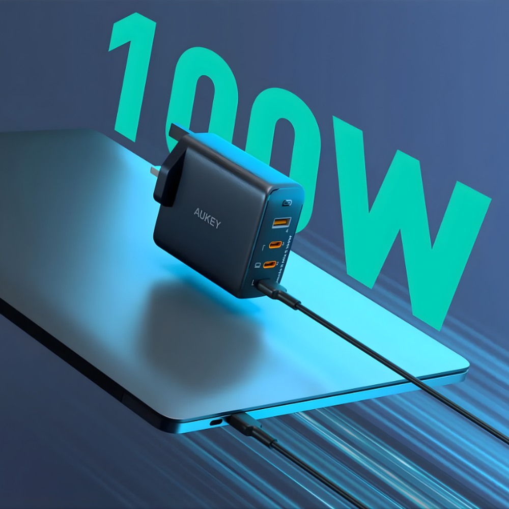 Aukey 100W laptop wall charger delivering high-speed charging
