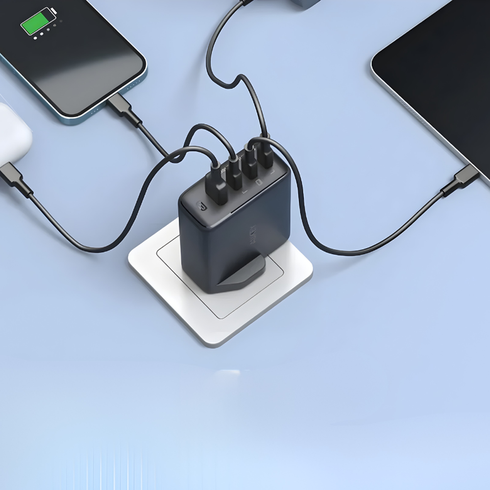 Aukey 4-port wall charger powering phone and tablet simultaneously