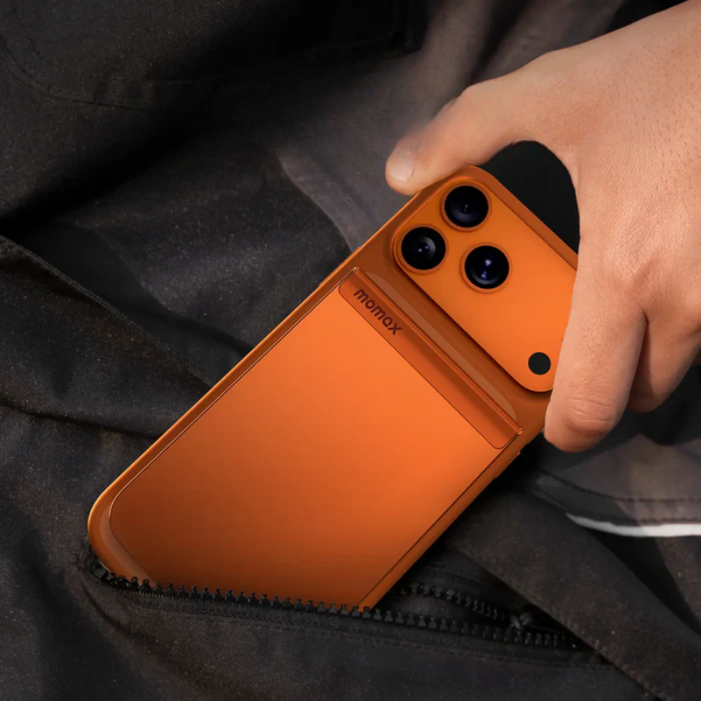 Orange Momax 15W magnetic power bank attached to smartphone in pocket
