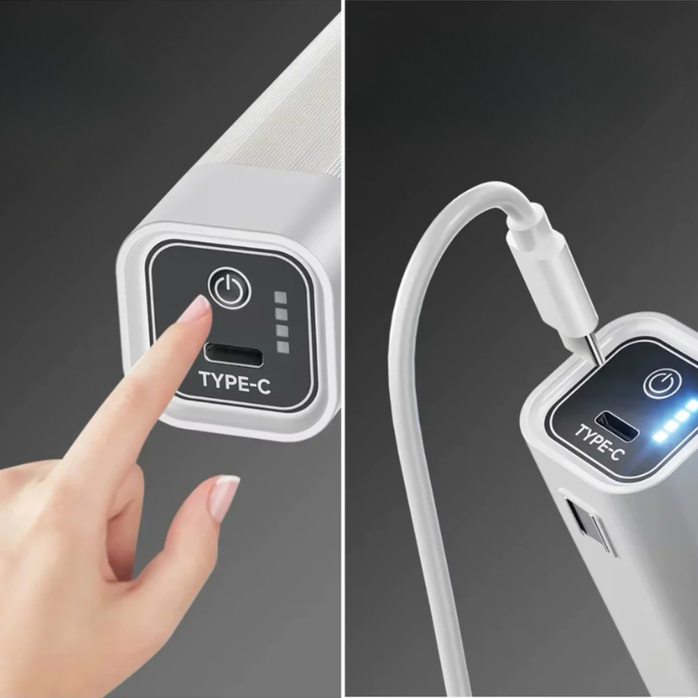 Hand pressing power button on 48W LED light showing blue status lights