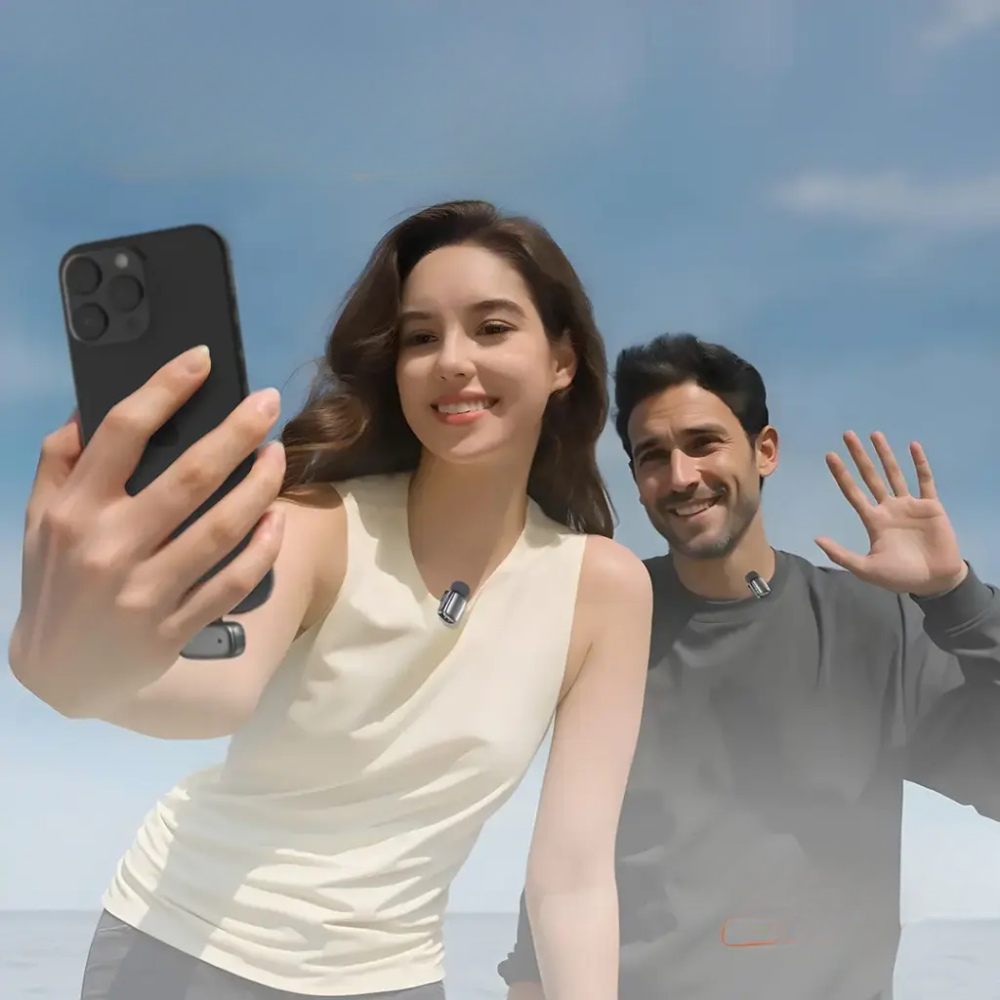Man and woman wearing Porodo clip-on wireless microphones for outdoor recording