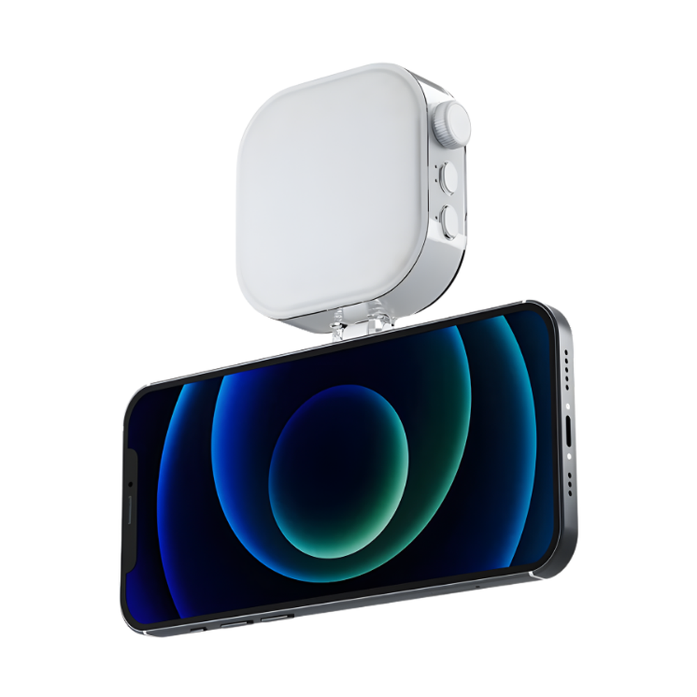 White Telesin RGB light with rotary dial and magnetic phone mount attachment
