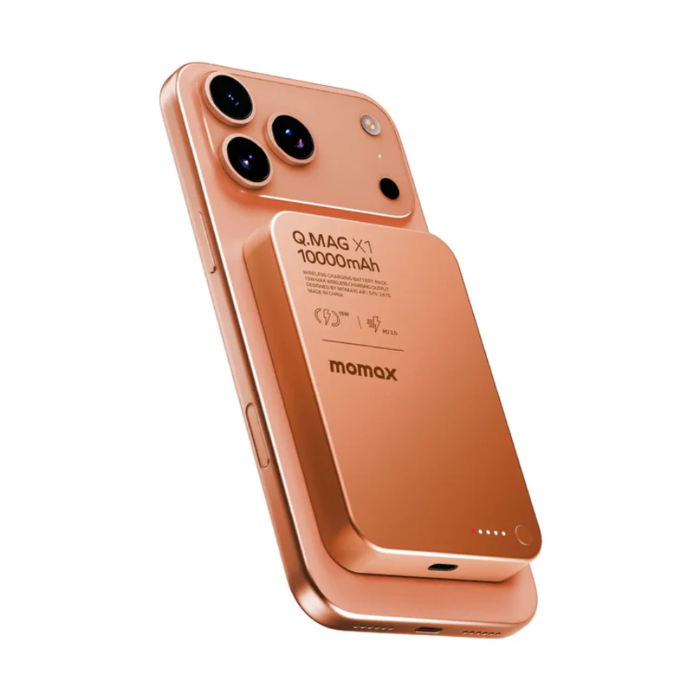 Rear angled view of copper Momax 15W magnetic power bank on smartphone showing specs