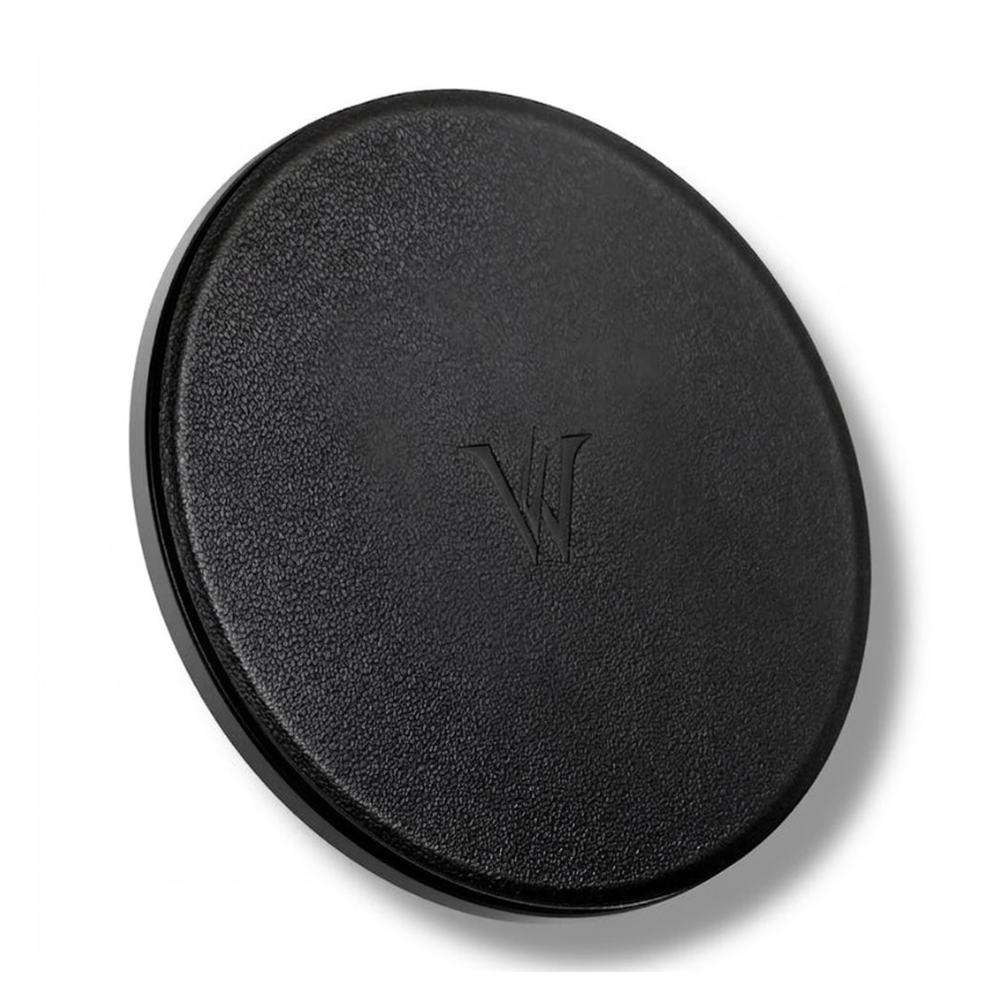 Black pebbled magnetic phone grip with smooth rim and centered logo