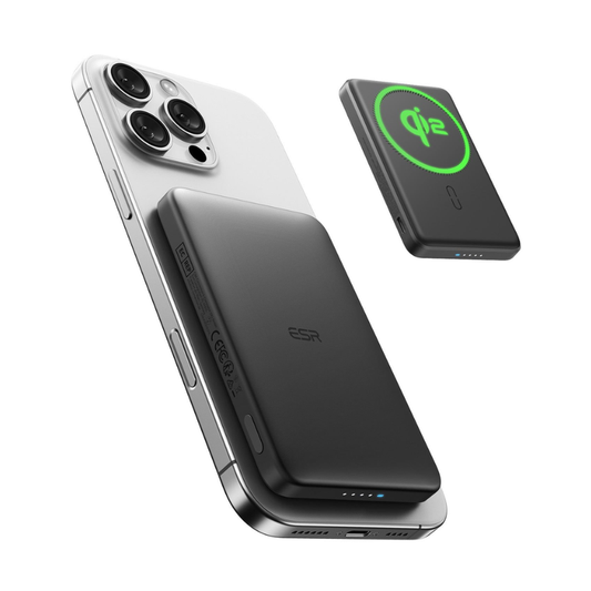 ESR 15W MagSafe power bank attached to iPhone showing Qi2 certification and LED battery indicators