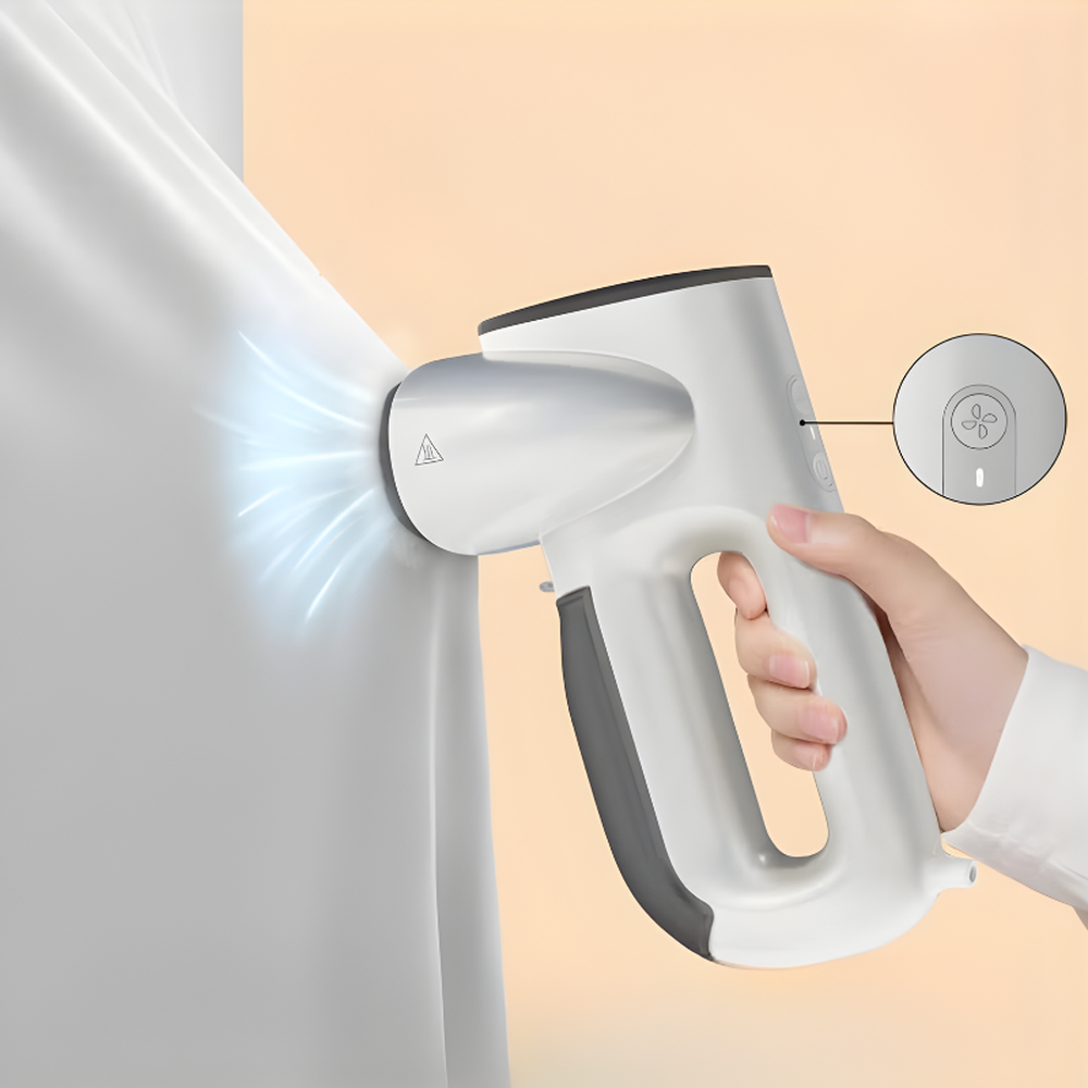 White neokosd handheld steamer emitting fast ultra-fine steam on fabric