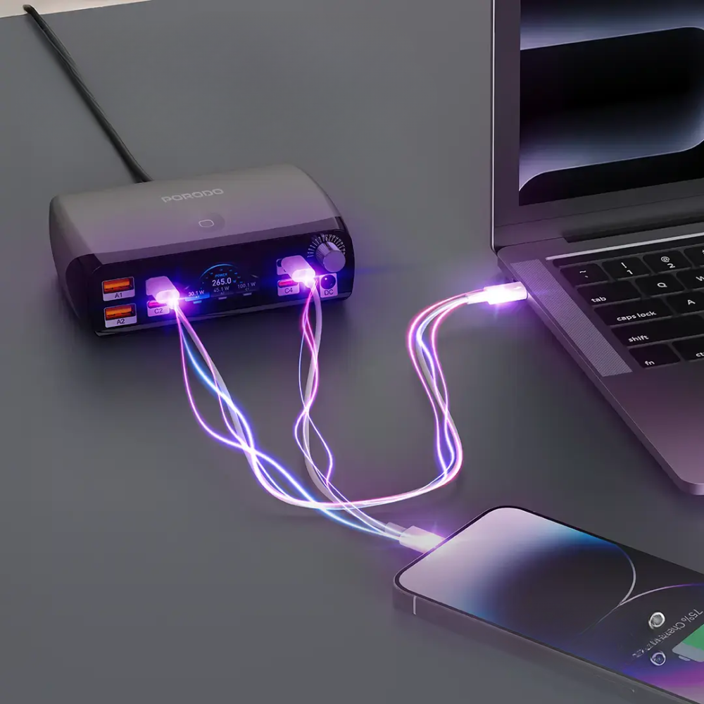 Porodo 100W PD charging hub with glowing cables connecting laptop and phone