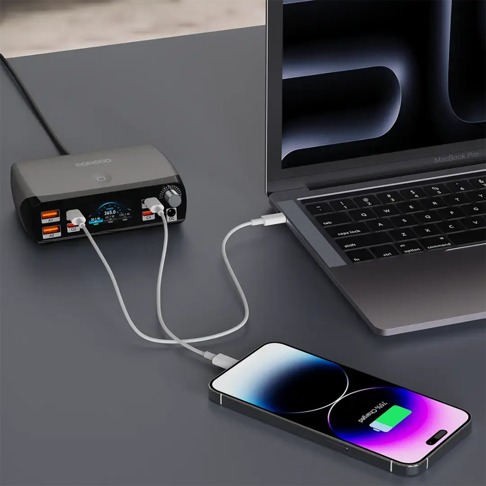 Porodo 252W charging station powering MacBook Pro and smartphone via USB-C and USB-A ports