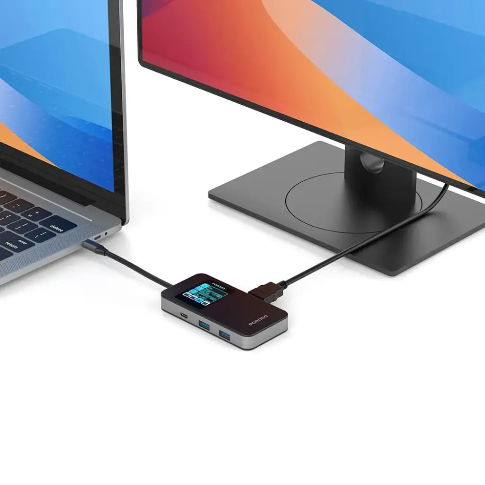 Porodo USB-C hub in desktop setup connecting laptop to external monitor