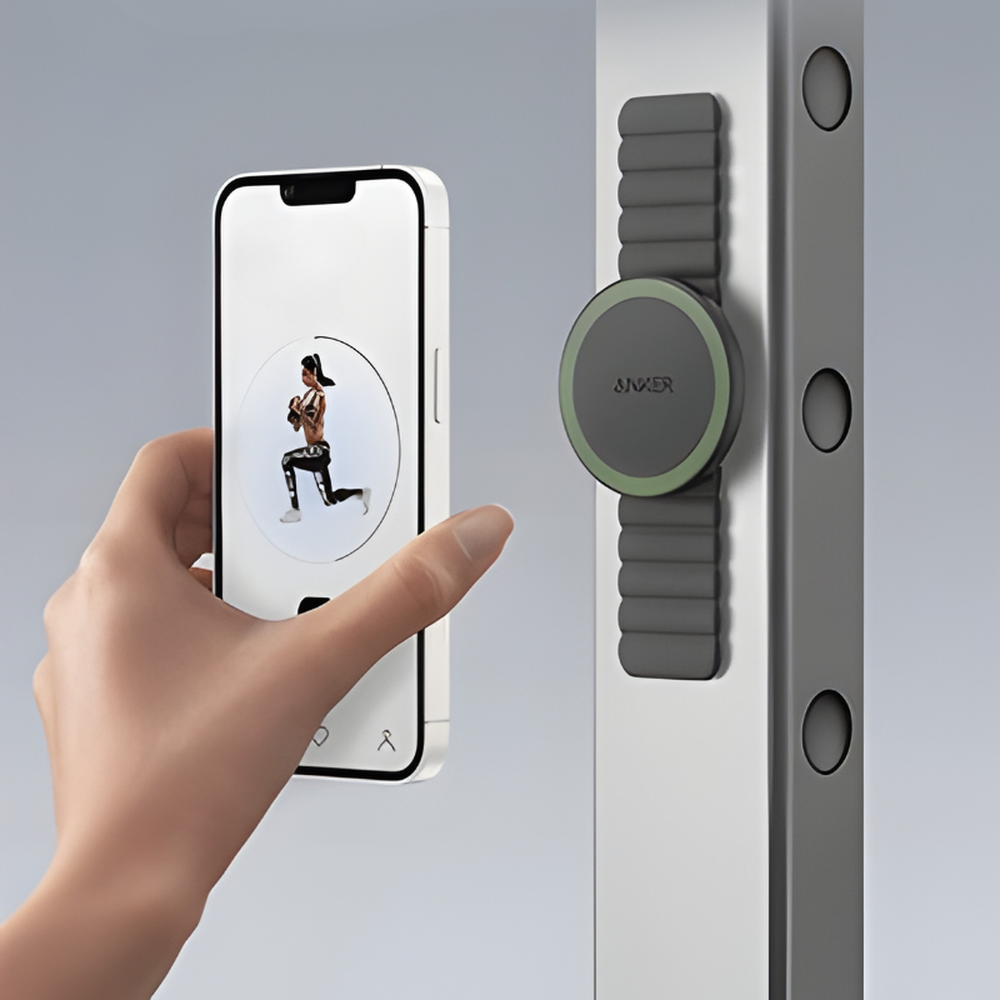 Anker magnetic phone grip mounted as vertical stand for hands-free exercise viewing