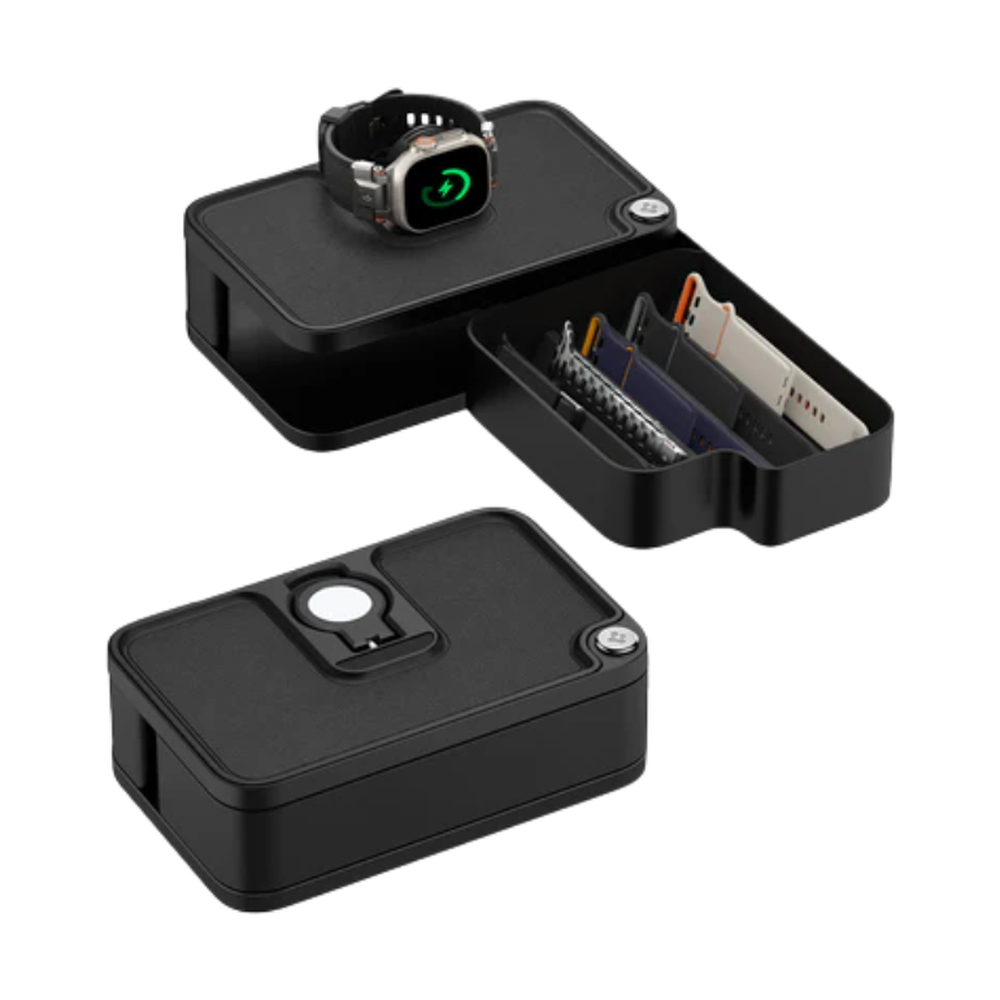Open black Apple Watch charging organizer revealing internal compartments for bands and accessories