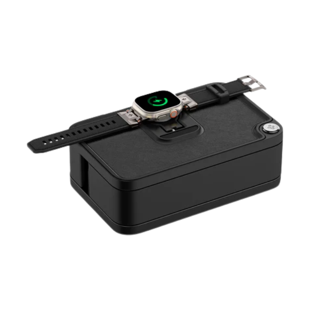 Black Apple Watch charging dock with magnetic puck displaying green charging icon
