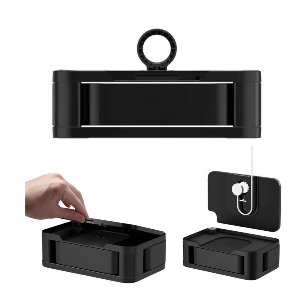 Black Apple Watch charging stand with removable lid and U-shaped cable management loop