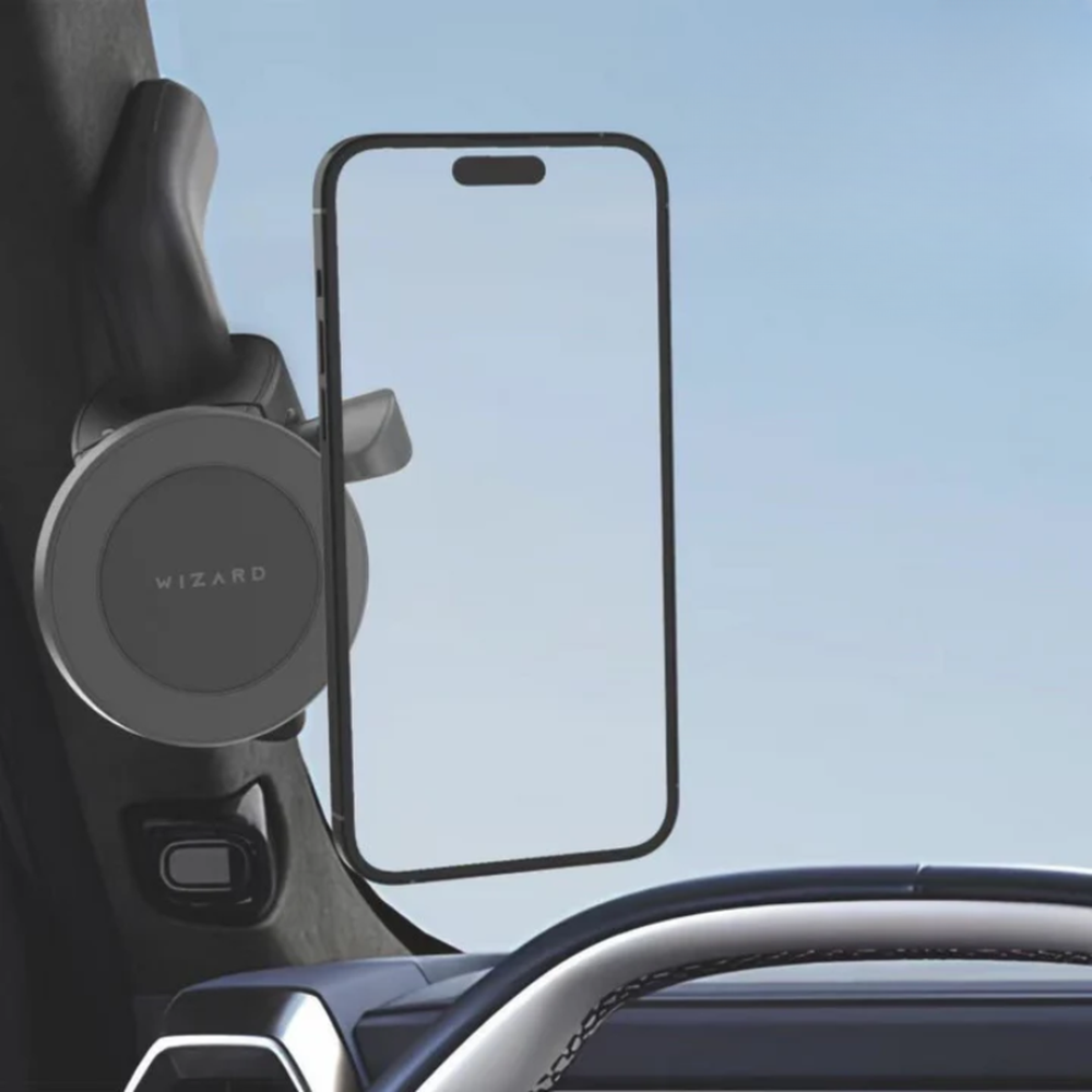 Black Wizard magnetic car phone mount holding smartphone on dashboard
