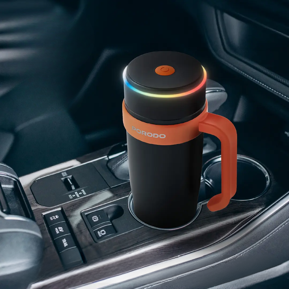 Black Porodo portable blender in car cup holder with LED ring light and power button