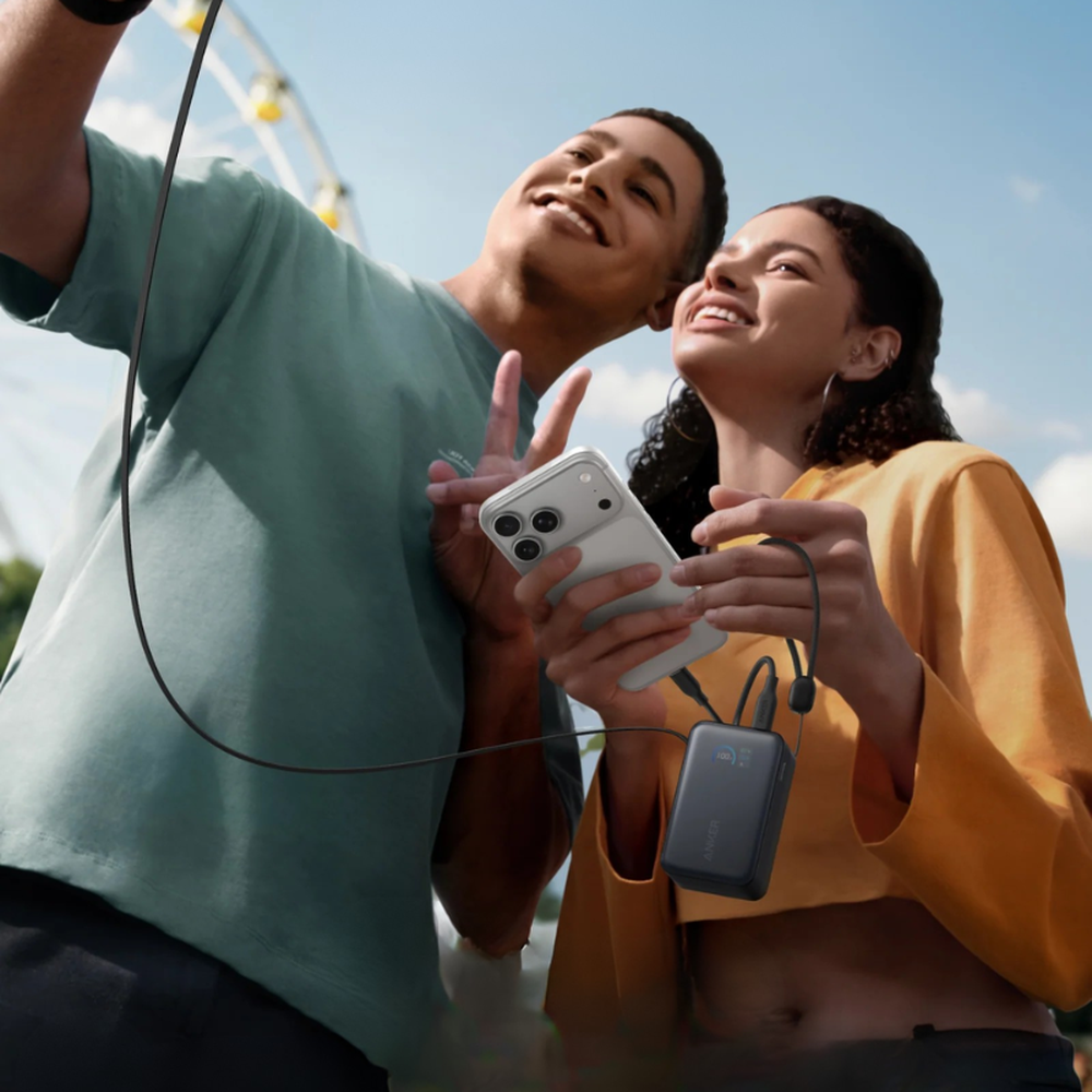 Outdoor use of Anker Nano power bank charging phone on the go