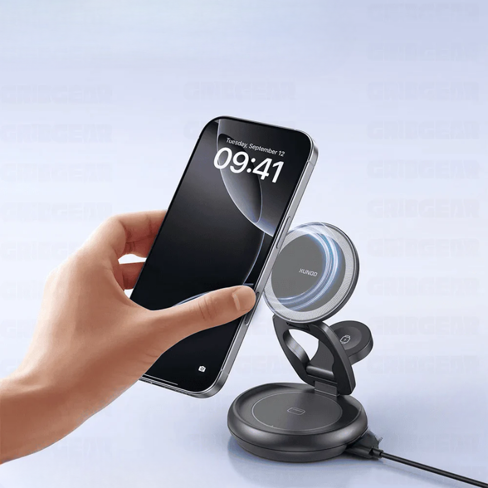 Hand placing smartphone on Xundd foldable wireless charger with blue LED indicator