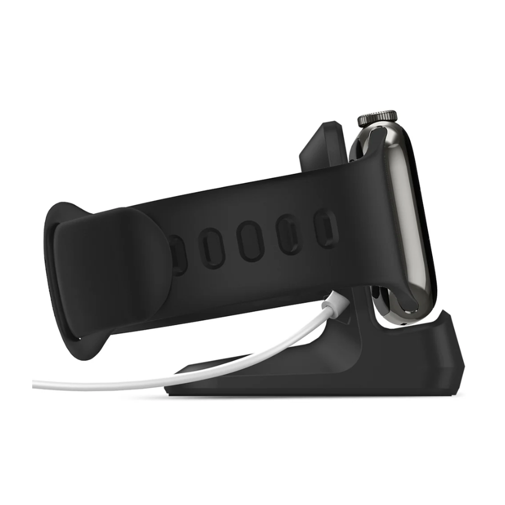 Black Spigen Apple Watch charging stand with matte finish holding watch upright for nightstand mode