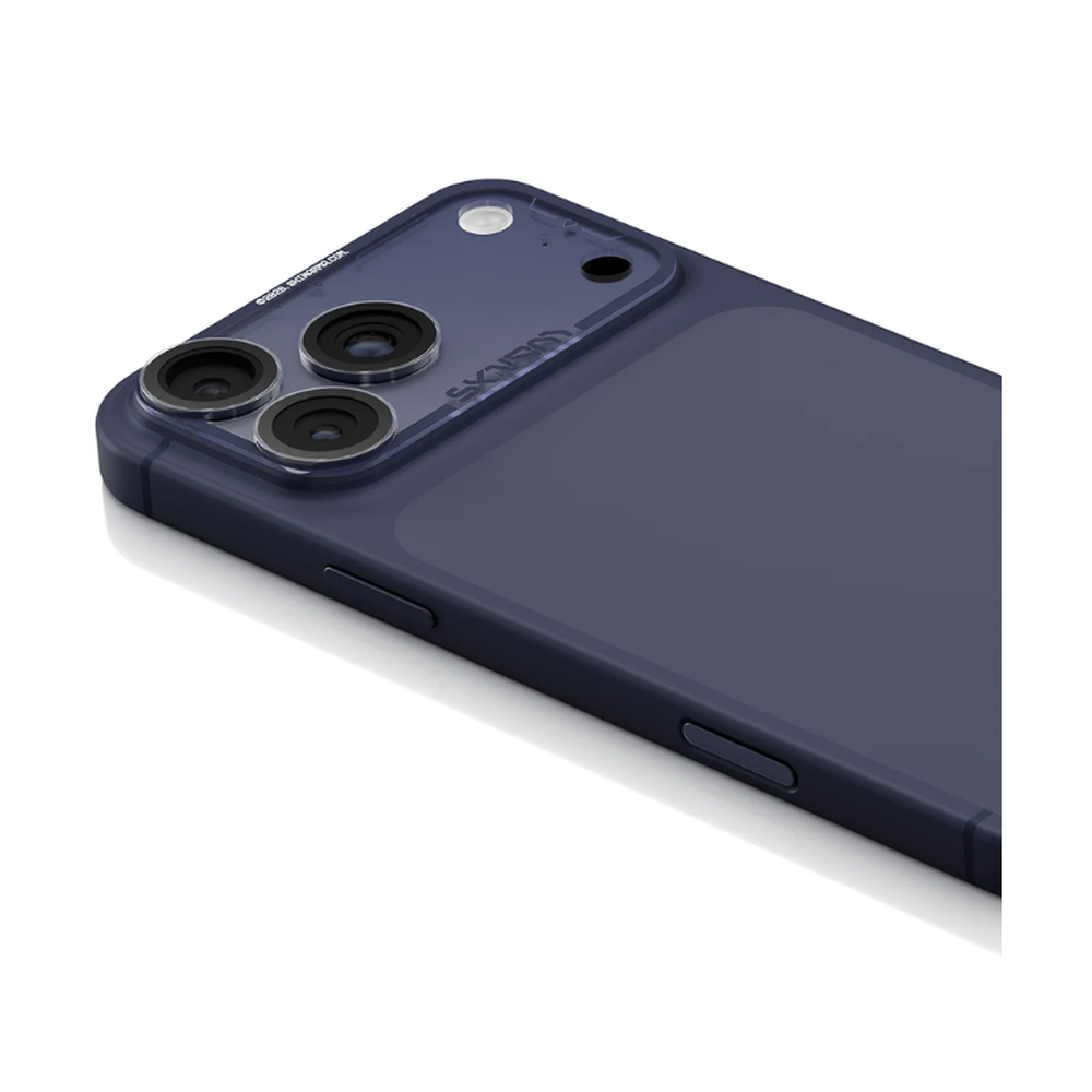 Installed Skinarma clear tempered glass camera protector on dark blue iPhone 17 Pro Max