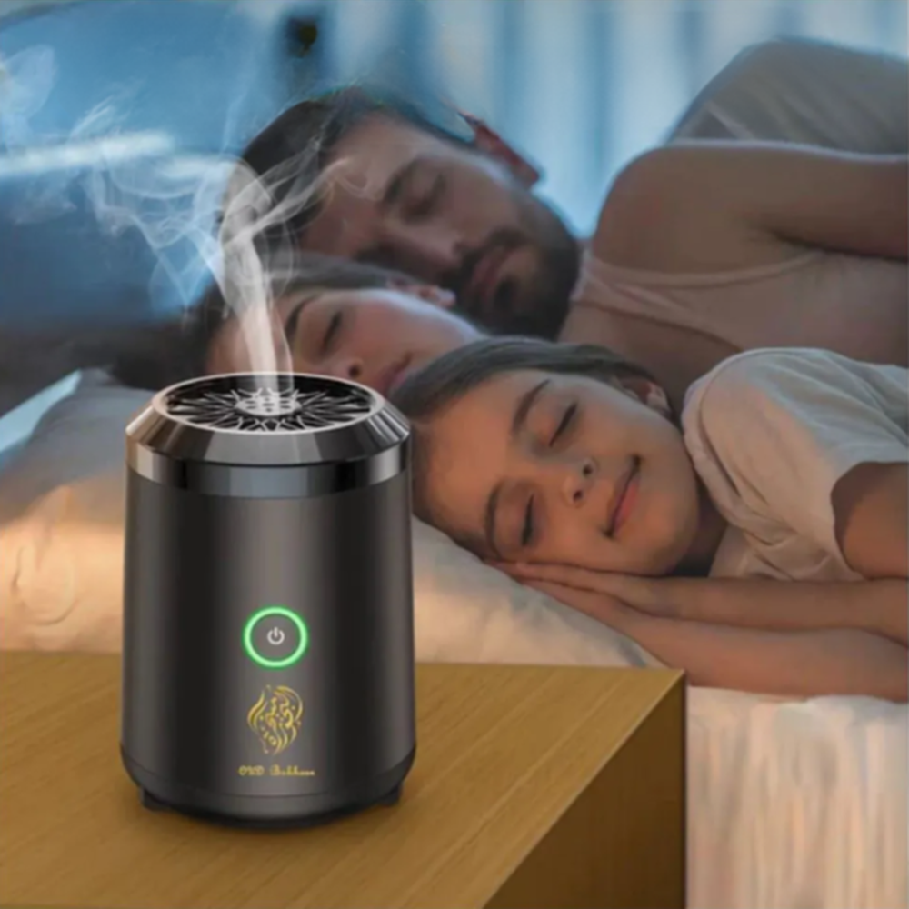 Smokeless black ceramic bakhoor device on nightstand in bedroom setting