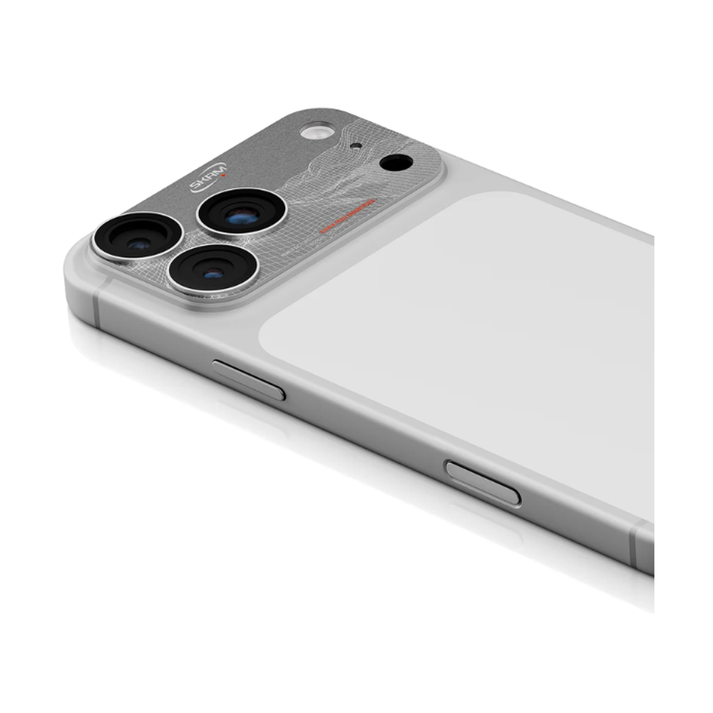 Silver iPhone 17 Pro Max installed with brushed metallic Skinarma camera lens guard and precise LiDAR cutout