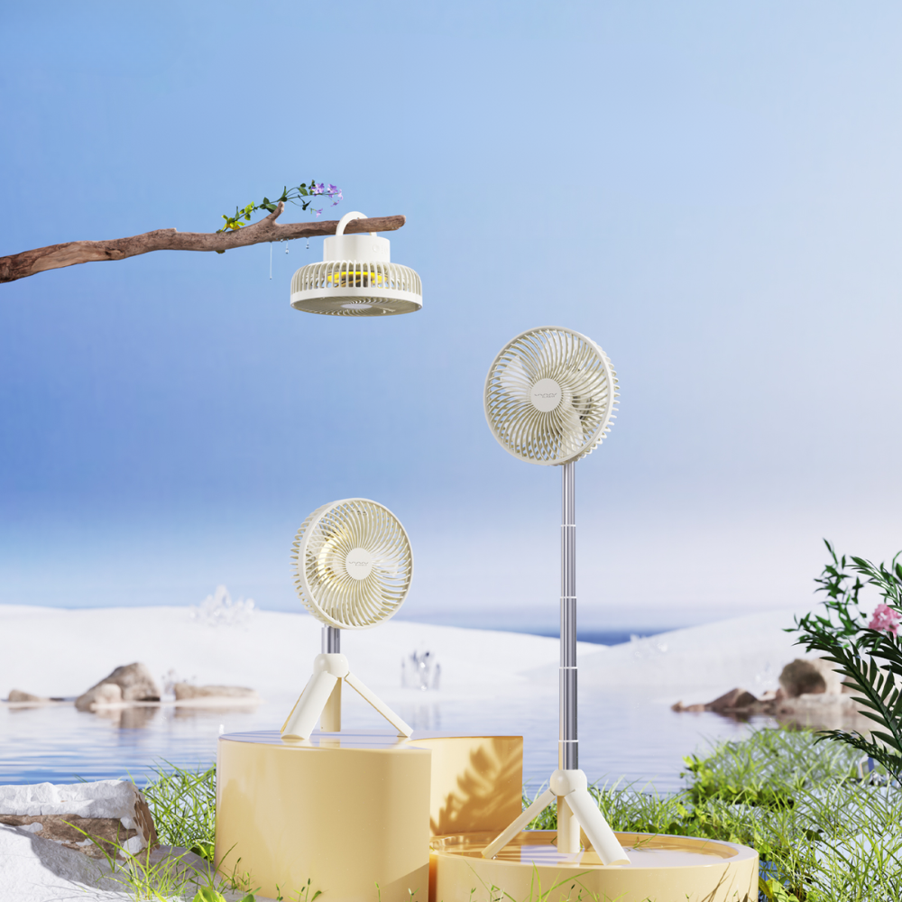 Multiple white camping fans in outdoor setting with hanging and tripod options