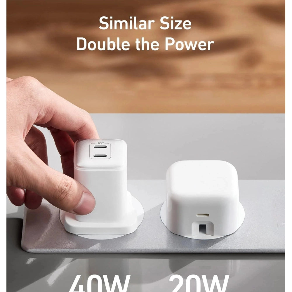 Compact Anker 40W dual USB-C wall charger compared to smaller model for size reference