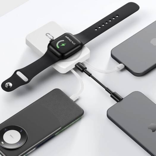 White Porodo power bank charging Apple Watch and smartphone simultaneously via MagSafe