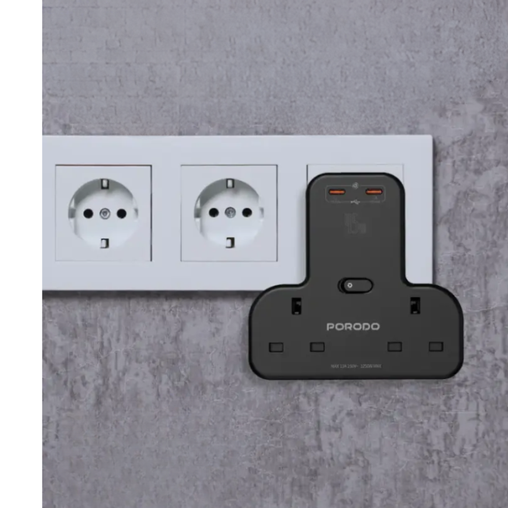 Black Porodo 3250W multi-port wall charger with dual 45W USB-C ports and UK AC outlets installed on gray wall