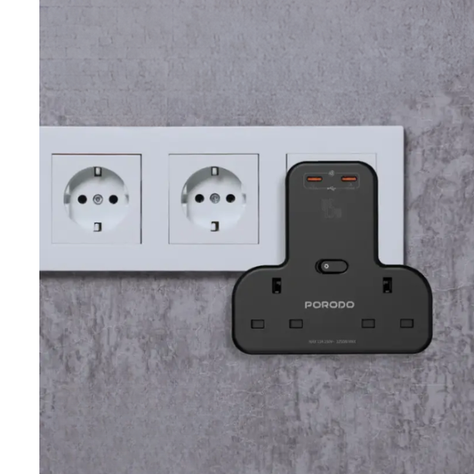 Black Porodo 3250W multi-port wall charger with dual 45W USB-C ports and UK AC outlets installed on gray wall